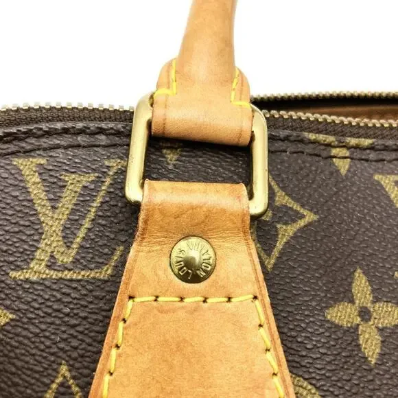 LOUIS VUITTON Brown Monogram Canvas Alma Bag